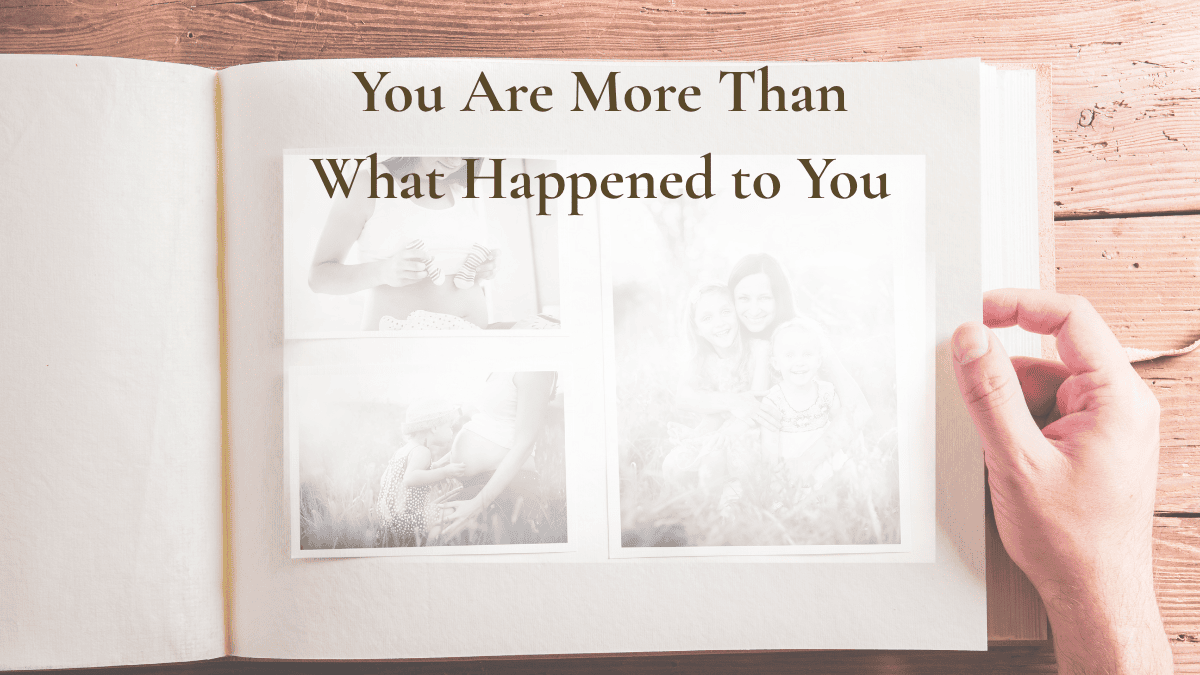 A person reflecting over an open journal and photographs, representing the story of who they were before life changed.